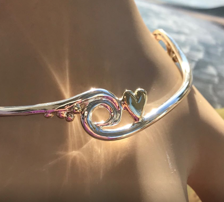 Silver and gold wave, heart and pebbles bangle