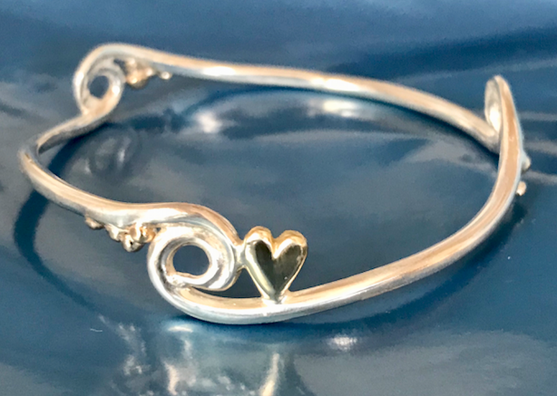 Silver and gold wave, pebbles and heart bangle