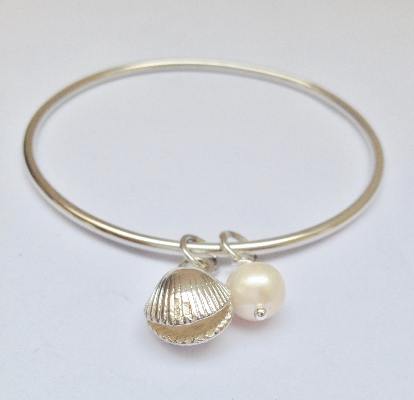 Silver cockle shell bangle