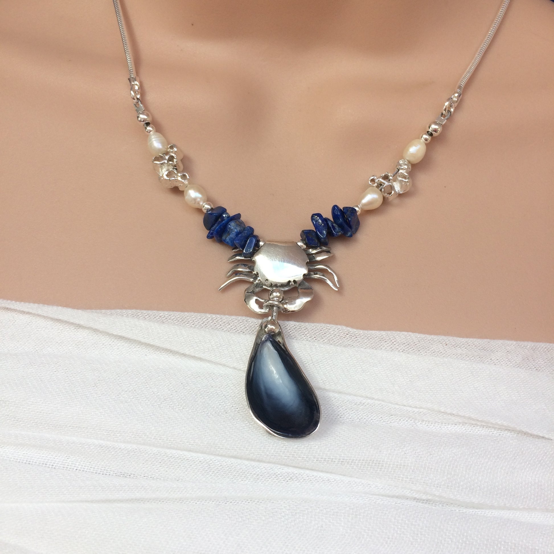 Mussel shell and crab silver necklace 