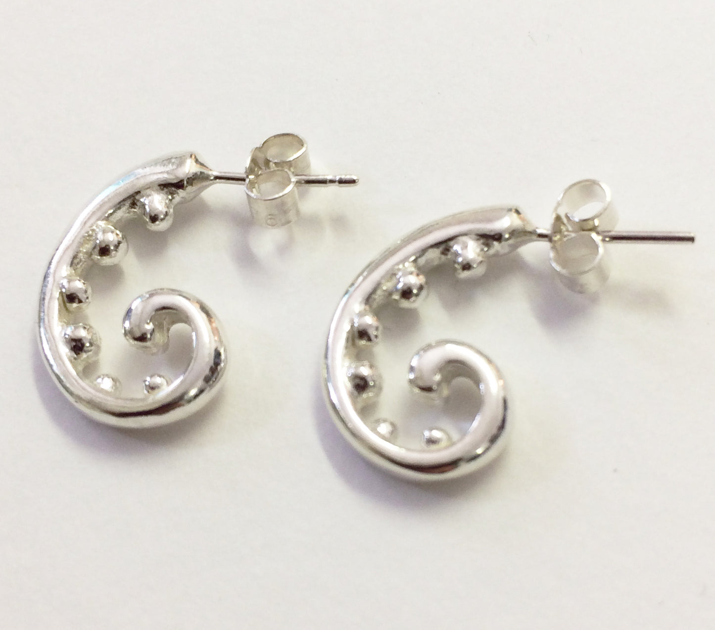 Silver fern earrings