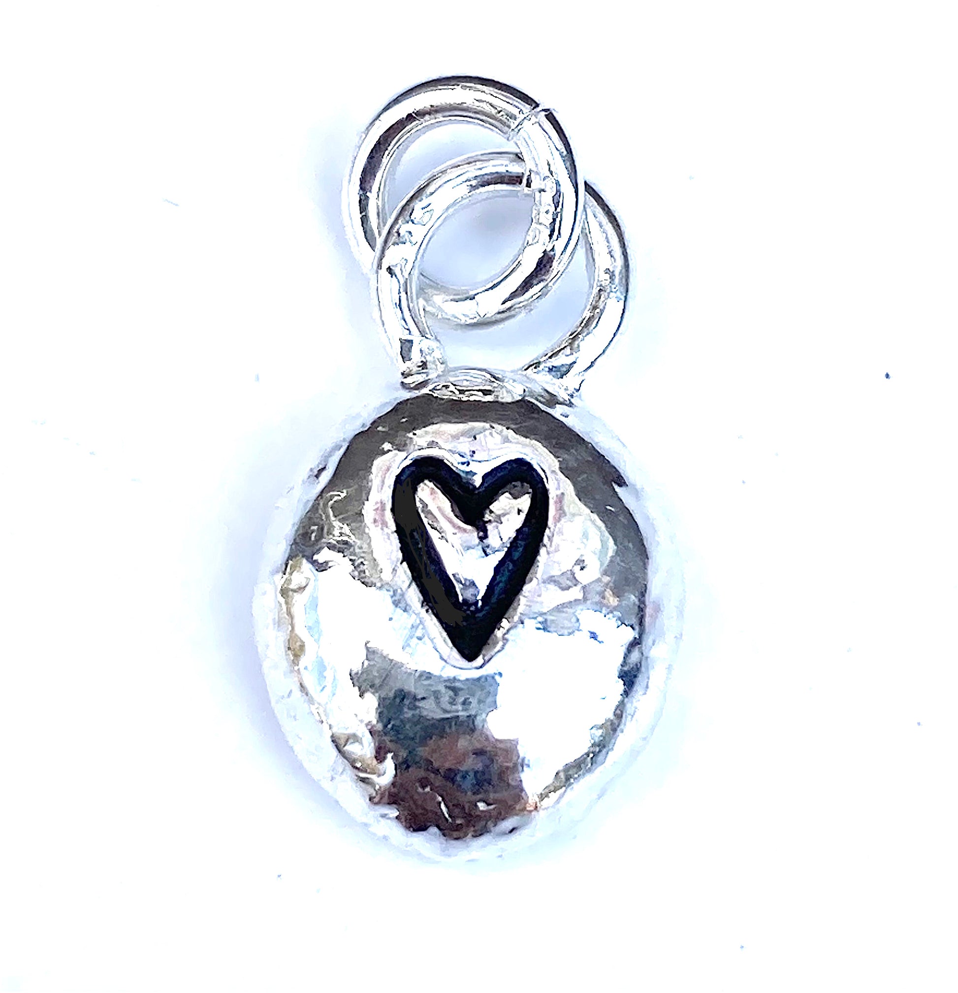Silver pebble heart charm