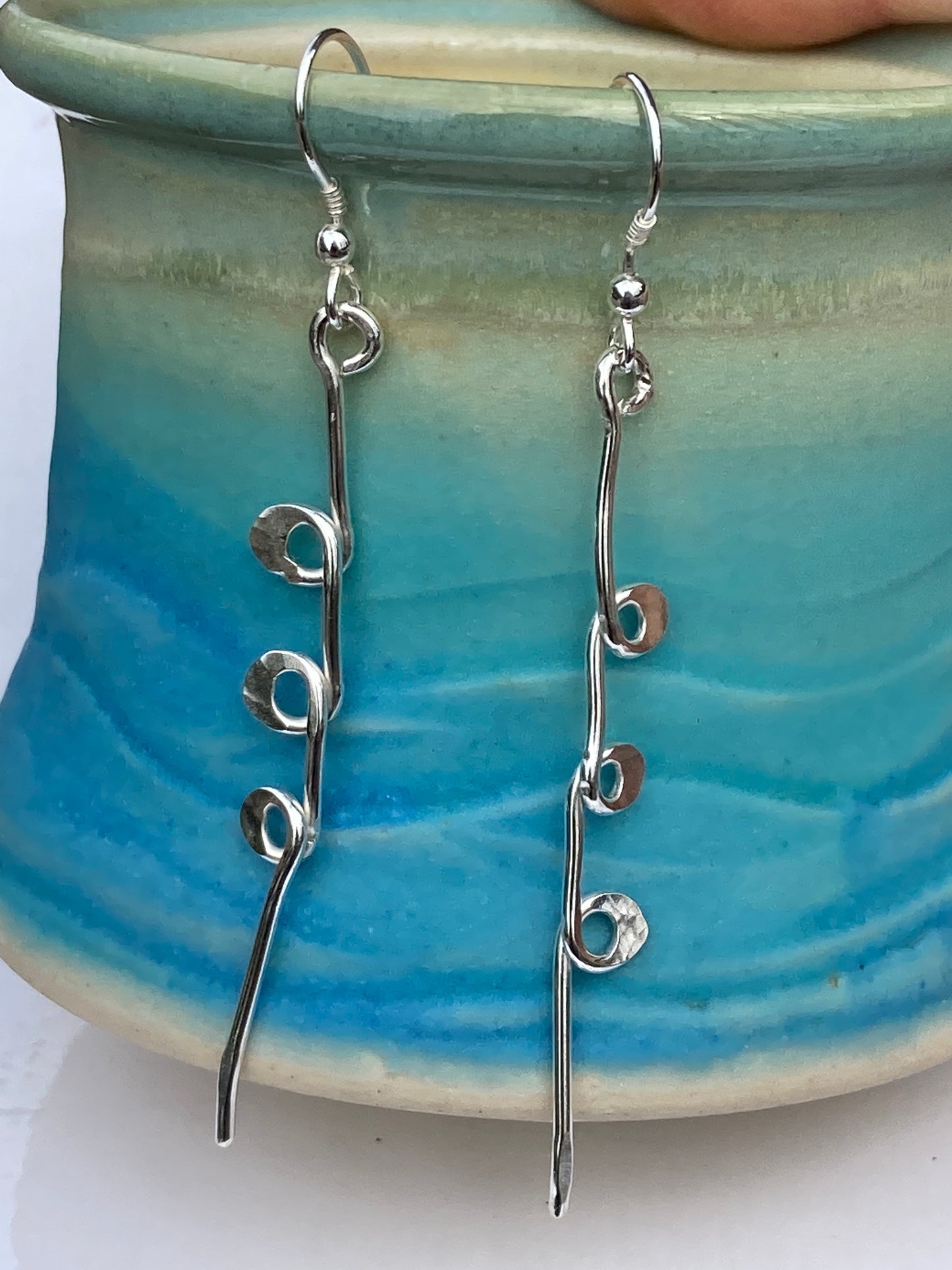 Silver long organic shaped earrings 3 loops
