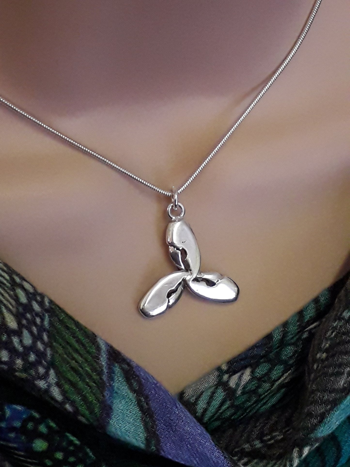 Triquetra lobster claws pendant on a silver chain