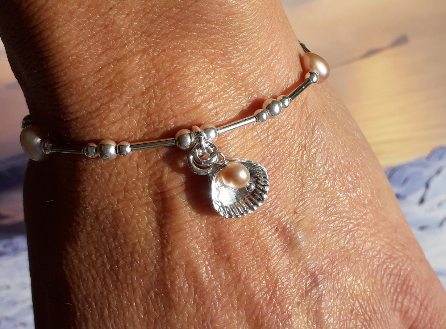 Cockle and pink pearl bracelet