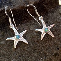 Silver starfish drop earrings with opal