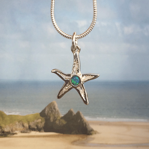 Silver starfish necklace with opal